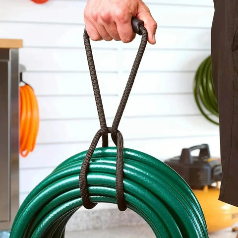 Heavy Duty Nylon Cord Strap Organizer Rope For Tailgate Parties And Campouts Holds Generator Cords Tight around green hose.