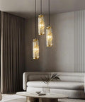 Gold 3 Light Modern Pendant Light Fixtures With Glam Crystal Chandeliers for kitchen, dining room, bedroom hanging above modern living room.