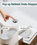 Plug And Play Toe Touch Bathtub Drain Stopper In Smooth Brushed Nickel for easy tub filling and draining with a hand press.