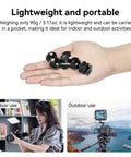 Double Ball Head With Cold Shoe Mount in hand, demonstrating lightweight portability for cameras, monitors, and video gear.