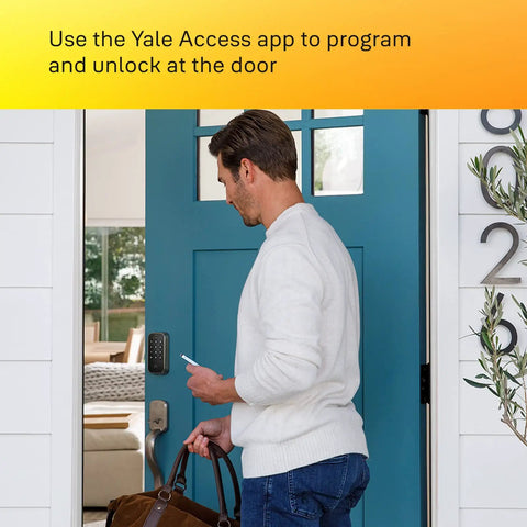 Man using Assure Lock 2 Deadbolt Keyless Door Lock With Satin Nickel Finish Digital Touchscreen Keypad Bluetooth Connectivity