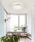 Crystal Ceiling Light Fixture LED Round Flush Mount Chandelier Dimmable 24W 2640LM 4000K Neutral White in a dining room.
