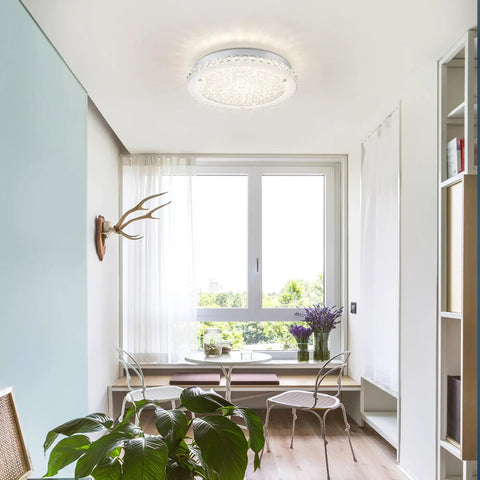 Crystal Ceiling Light Fixture LED Round Flush Mount Chandelier Dimmable 24W 2640LM 4000K Neutral White in a dining room.