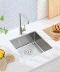 Bar Sink 15 By 15 By 8 Inch Undermount Single Bowl Stainless Steel Kitchen Sink T-304 With Strainer in a modern kitchen