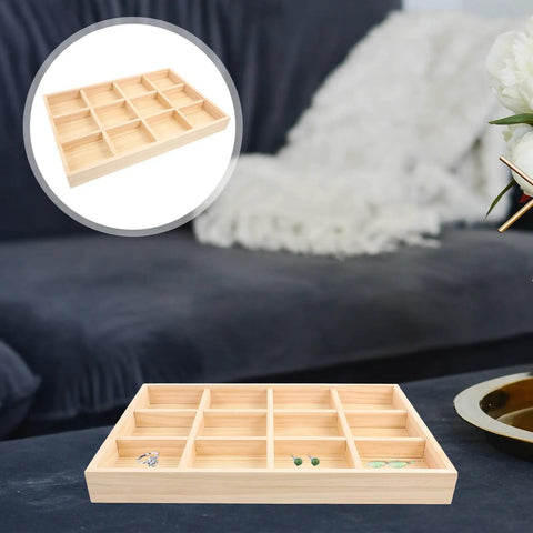 Solid Wood Jewelry Organizer Tray With Twelve Grid Compartments For Rings And Necklaces Vintage Decorative Vanity Holder on a dark sofa.