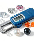 Digital Gauge Mrg-25 Electronic Pearl Calipers for Diamond Gemstone Jewelry with various gemstones and pearls on a white background.