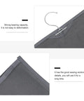 Close-up of Rock Solid Four Layer Closet Hanging Shelf with sturdy hook, detailed nonwoven mesh fabric for durability.