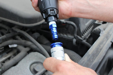 Five Piece T Style Air Coupler And Plug Kit In Blue One Quarter Inch NPT Pro Grade Durable Anodized Steel in use