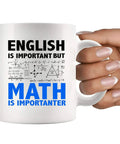 Math Is Importanter Mug For Math Lovers Funny Engineer Gift For Dad Boyfriend Husband Brother Teacher Or Engineering Student White Ceramic 11 Oz Novelty Drinkware with math graphics held by a hand.