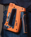 Heavy Duty Cable Stapler Built Tough For Voice Data Video And Nonmetallic NM Cable on tool belt close-up view