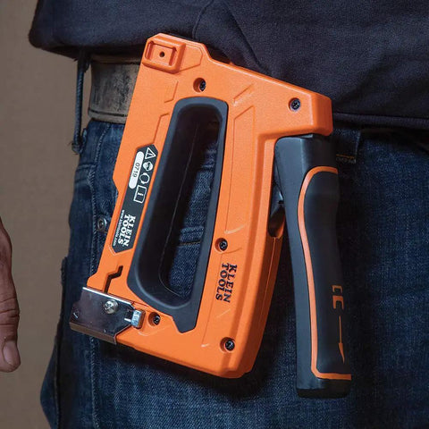 Heavy Duty Cable Stapler Built Tough For Voice Data Video And Nonmetallic NM Cable on tool belt close-up view