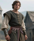 Person wearing Totally All In One Medieval Renaissance Sword Belt Set for pirate costumes and LARP gear in a village setting.