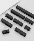 Must Have All In One DIP IC Socket Adaptor Kit With 35 Pieces 2.54mm Pitch covering 20-50 pin sockets on a gray background.
