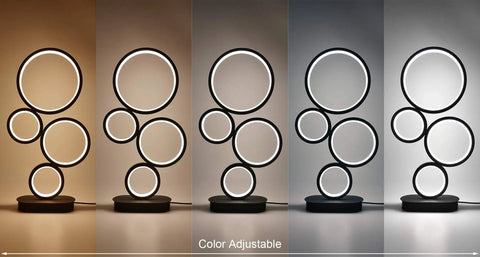 Four Circle Dimmable LED Table Lamp With Color Adjustable Light Modern Round Design 12W Black Finish showing color variations