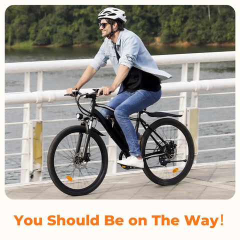 Man riding Beast Mode 1500W Peak Electric Bike For Adults with dual disc brakes and adjustable seat on bridge