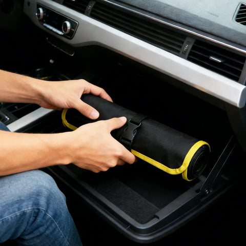 Person placing Drill Bit Organizer Roll Up Case With Zipper Heavy Duty Bit Holder Pouch in car's glove compartment