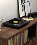 Sony PS-LX310BT Belt Drive Turntable Fully Automatic Wireless Vinyl Record Player on a wood shelf with records.
