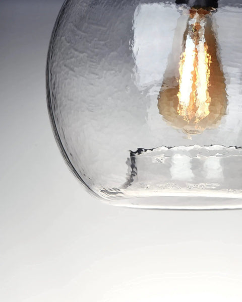 Close-up of hand blown glass pendant lighting for kitchen island and dining room modern farmhouse globe ceiling light 11-inch diameter