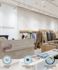 Pro Grade 17.5W LED H Track Light Heads Pack Of 4 illuminating retail store with neutral white finish and flexible positioning.