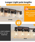 Comparison of two black finish wall sconces, top is Farmhouse Rustic Vanity Light Over Mirror 4 Light Industrial Wall Sconce With Clear Glass Shades Vintage Wood Accents Black Finish For Bathroom Bedroom Living Room Hallway. Top sconce measures 27.44in with clear glass shades, bottom measures 23.6in.