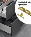 Adjustable Roller Ball Door Catch for Cabinets, Closets, Wardrobes, shown with open drawers and brass finish detail