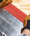 24 Inch Steel Sheet Metal Folding Tool with Grips for Standing Seam Roofing Panels in use on metal and wood