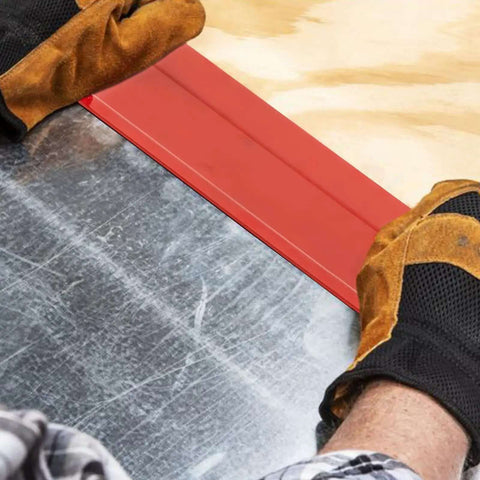 24 Inch Steel Sheet Metal Folding Tool with Grips for Standing Seam Roofing Panels in use on metal and wood