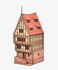 Realistic Medieval Rowhouse DIY Wood Building Kit For Teens And Adults, assembled model with red roof and detailed facade.