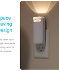 4-In-1 Power Outage Plug In Night Light And LED Flashlight plugged into wall socket with light glowing, compact white design