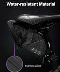 Water Resistant Under Seat Bike Bag 1L Saddle Pack For Mountain Road And City Commuter Bikes PVC Free Construction With 900D Oxford Fabric And PU Coating Rainproof Lightweight Easy Access Storage on bike depicting water-resistant material and seamless zipper.