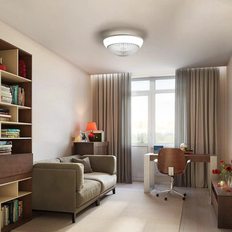15 Inch Enclosed Bladeless Ceiling Fan with RGB Dimmable LED Light, stylish low-profile design in modern living room setting.