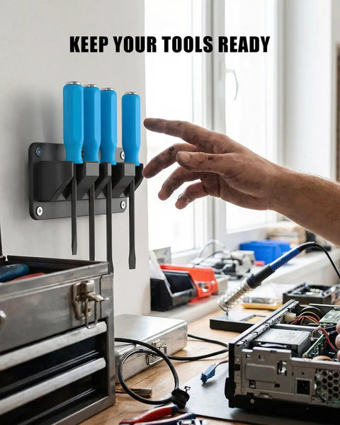 Four Slot Magnetic Pry Bar Organizer With Mounting Holes For Garage Or Shop on wall holding blue-handled pry bars.