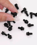Hand holding M4x10mm VESA Screws Set With Lock Washers And Flat Washers, 20 Pack, Phillips Head, Black Finish for TV Wall Mounting.