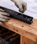 Hands assembling 14 Inch Full Extension Drawer Slides 3 Fold Side Mount Glides Beefy 100 Lb Capacity on workbench