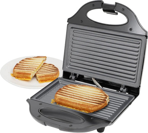 Dude, this killer Compact 750W Electric Nonstick Sandwich Maker And Panini Press Grill with grilled sandwich inside.