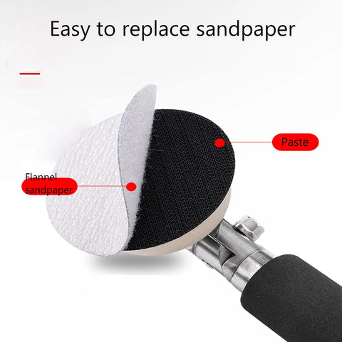 Close-up of the handheld wood turning lathe sander's replaceable sandpaper disc with flannel backing.