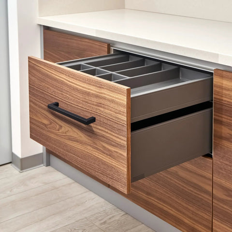 Matte Black Cabinet Handles Set Of 10, 5 Inch Center To Center, shown on a wooden kitchen drawer.