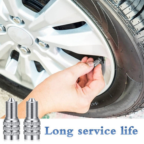 32 Pieces Double Seal Valve Stem Caps For High Pressure Tires Metal Flow Through Air Caps For Trucks Cars RVs Semis Buses Vans Trailers Boats Silver Heavy Duty Shiny being installed on car tire, showcasing durability.