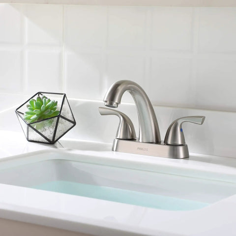 Two Handle Deck Mounted Bathroom Sink Faucet With Brushed Nickel Finish in modern bathroom setting, near sink with overflow