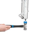 Go-To Shop Hammer With Fiberglass Handle And Soft-Touch Grip, Non-Marring 8 Oz Forged Steel Head in use on metal surface