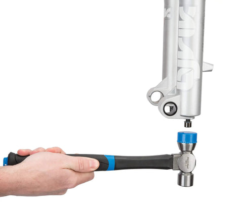Go-To Shop Hammer With Fiberglass Handle And Soft-Touch Grip, Non-Marring 8 Oz Forged Steel Head in use on metal surface