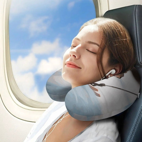 U Shaped Travel Neck Pillow With Skiing Squirrel Design offering ergonomic comfort for long flights, used by a woman on a plane