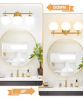 Next Level Three Light Bathroom Vanity Lights In Brushed Gold Finish With Milky White Glass Globe Shades Modern Wall Sconce Over Mirror, shown in up and down orientations above round mirror.