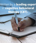 Tackle Chronic Pain With This CBT And Mindfulness Workbook: Simple Brain-Reset Techniques To Cut Pain, Boost Mood, And Reclaim Your Daily Life With Practical, No-Nonsense Exercises For Real World Pain Relief, Steady Progress, And Less Stress. CBT workbook cover with pen