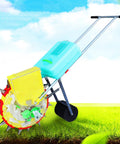 Portable Manual Seeder Spreader With Ten Seed Plates, Hand Push Roller Seeding Tool And Fertilizer Applicator in garden
