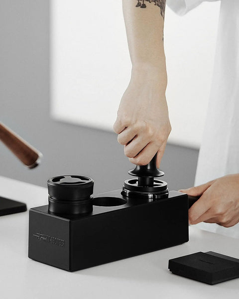Person using Walnut 4 In 1 Espresso Knock Box And Tamping Station With Portafilter Holder Tamper Holder And Distributor Holder