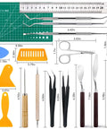 28-piece precision craft tools set for vinyl weeding with tweezers, scissors, blades, scrapers, and cutting mat