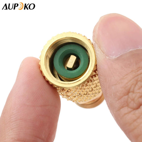 R410A Straight Swivel Mini Split Adapter With Five Sixteenth SAE Female To One Quarter SAE Male Quick Couplers For HVAC And Ductless Mini Split Systems Pro Grade DIY Friendly Two Pack brass adapter close-up with green seal