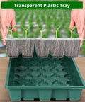 Hands holding Seed Starter Tray With Grow Light And Digital Controller 80 Cell Germination Kit with seedlings above dark green tray