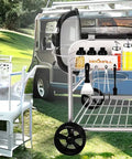 Outdoor Grill Table Cart For 22 Inch And 18 Inch Original Kettle Charcoal Grills, beside a dining table and camper van.